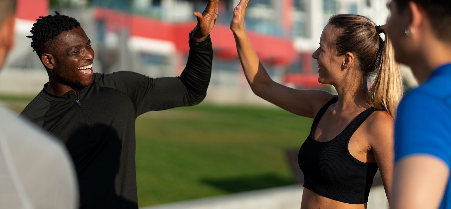 Two students High Fiving